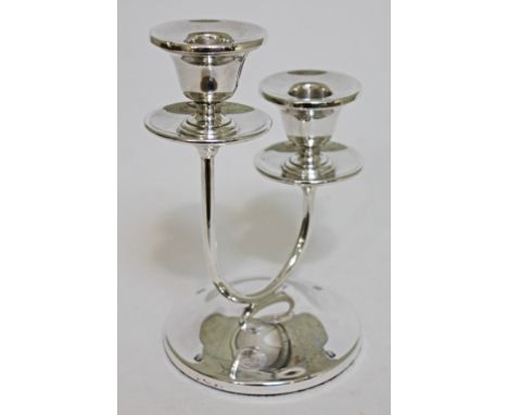 A contemporary hallmarked silver two branch candelabra, height 17.5cm.  