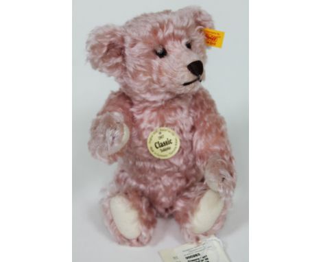 A Steiff pink mohair 1907 classic series teddy bear with ear tag and labels, no. 000263  