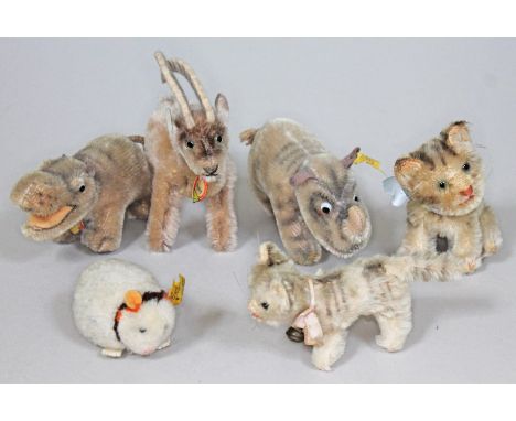 A group of six small Steiff animals.  Condition - large cat missing ear tag, 'Mockie' and 'Rocky' lacking ear tag but come wi