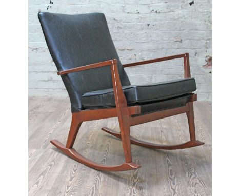 A Parker Knoll rocking armchair. &nbsp;(This item may not comply with the Furniture and Furnishings (Fire) Regulations 1988 a
