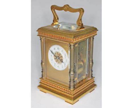 A French late 19th century gilt brass carriage clock, 8 day repeating movement striking on single gong, height 18cm.  Conditi