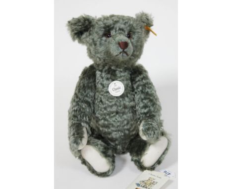 A Steiff olive colour mohair  1907 classic series teddybear with ear tag and labels, no.000317  
