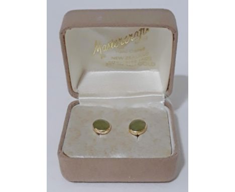A pair of 14ct gold jade cabochon stud earrings, approx. 9mm x 7mm, marked '14K', gross weight 2.3g.  
