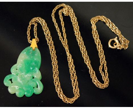 A 9ct gold chain with carved jade pendant, chain length 57cm, pendant length 3cm, chain marked '9ct', gross weight 5.5g.  