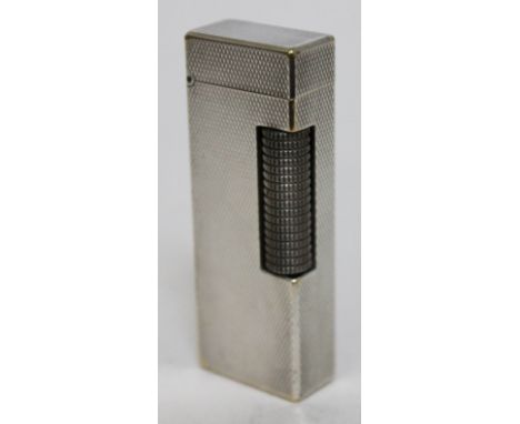 A Dunhill silver plated lighter, length 6.3cm.  