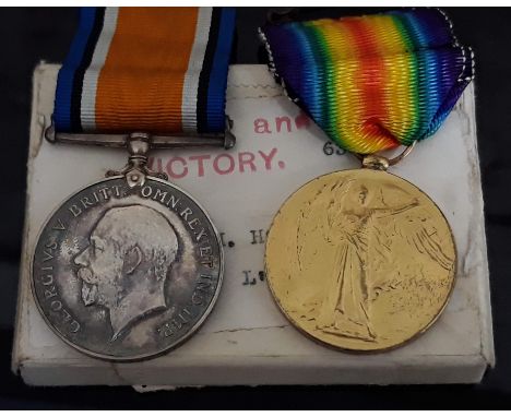 A WWI pair awarded to 5752 PTE W.H. HOWARD. L. POOL R with original box.  