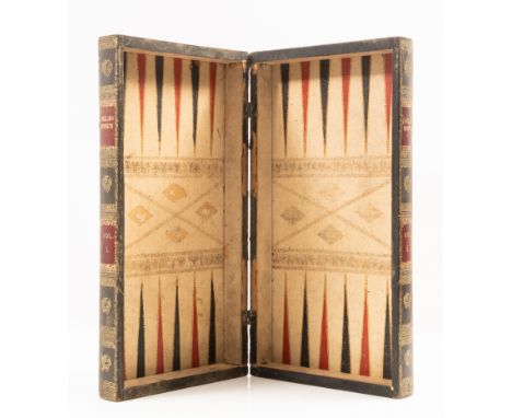 Board games.- English Sports, folding chess and backgammon board, bookform board in the shape of two books, with red and blac