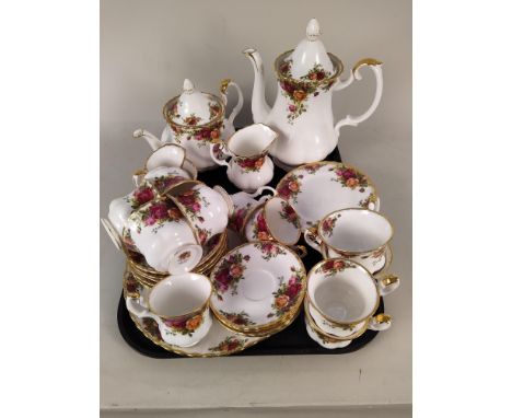 A Royal Albert Old Country Roses part tea set including tea and coffee pots, two jugs, sugar bowl, sandwich/cake plate, eleve