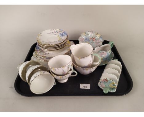 A Foley china part tea set, five cups and saucers, plate and sandwich plate plus a Shelley 'Melody' pattern toast rack, a sma