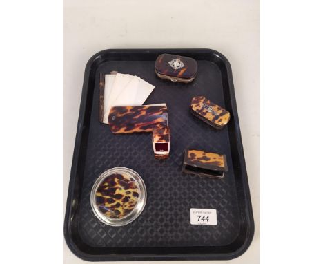 A good selection of antique tortoiseshell wares in snuff boxes, toothpick box, daily notebook, white metal inlaid purse and p