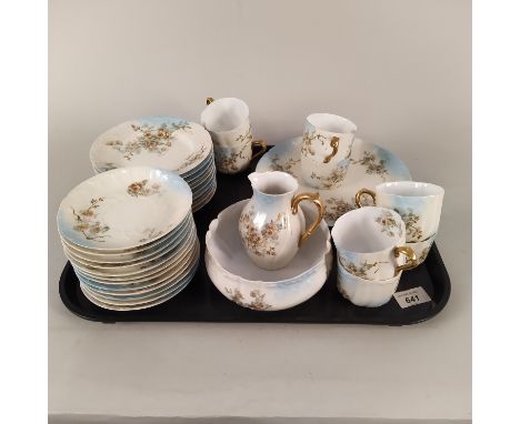 A Limoges R Delinieres France part tea set, eight cups and saucers, milk, sugar and side plate, originally a twelve setting w