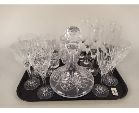 A crystal glass decanter, tumblers, wine glasses and jar, plus other glasses