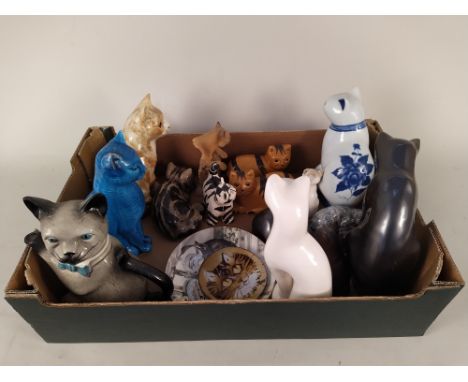 A large number of cat ornaments including Beswick, Winstanley etc and a cat teapot
