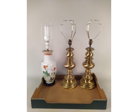 A large pair of brass lamp bases, 16 1/2" long plus an oriental style ceramic lamp base (all require re-wiring)