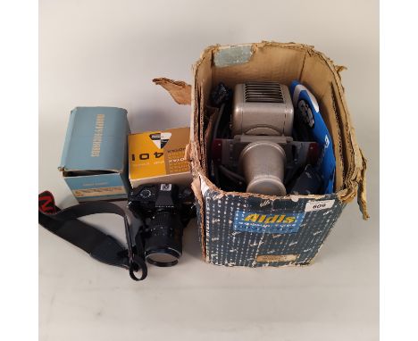 A quantity of photographic equipment including a Pentax P30, slide viewer/projector etc