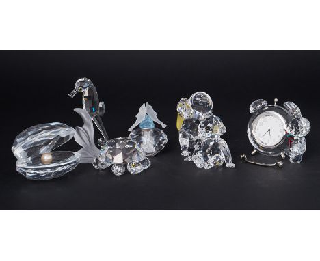 Swarovski Crystal Glass, a small collection of seven pieces including 'Clam with Pearl', 'Gorilla', 'Kris Bear Table Clock', 