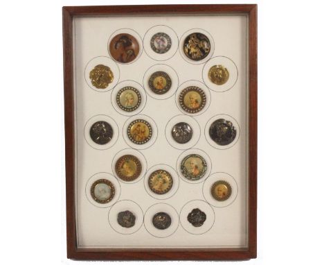 Buttons - a framed display of twenty, mostly featuring portrait busts including a Japanese wooden example, six silver example
