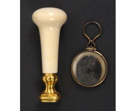 A 19th Century ivory handled seal and a wax impression of the Privy Purse seal, the seal with gilt metal mount to hardstone i