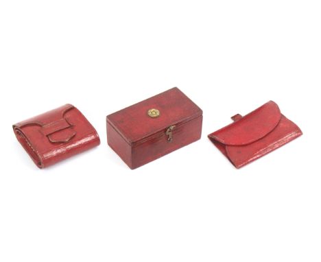 Three Regency red leather sewing accessories, comprising a small rectangular box with swivel catch, the lid with gilt flowerh