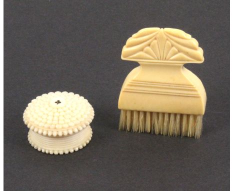 Two 19th Century ivory pieces comprising an engine turned circular box containing four circular playing card markers 3cm dia.