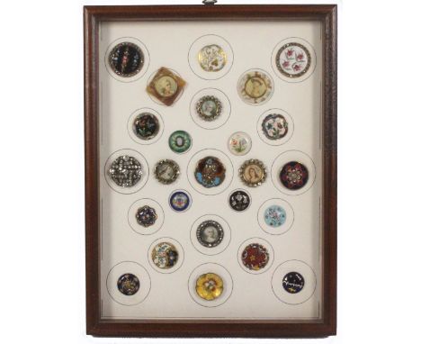 Buttons - a fine framed display of twenty five, including two 18th Century floral enamels with cut steel borders, two similar