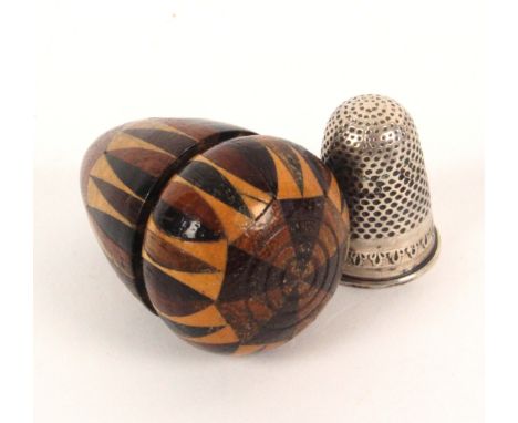 A Tunbridge stick ware thimble acorn, containing a silver thimble, 4.2cm.Ê