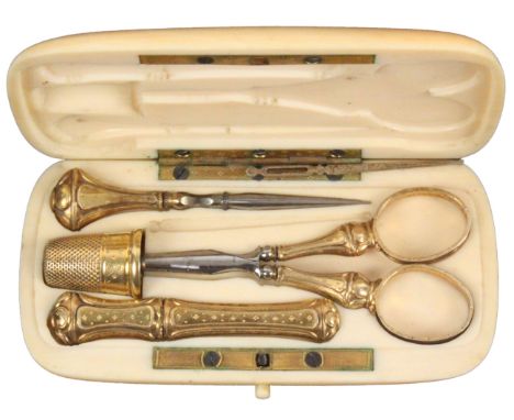 A late 19th Century French ivory etui, the case of rounded corner rectangular form, the interior flush fitted with silver gil