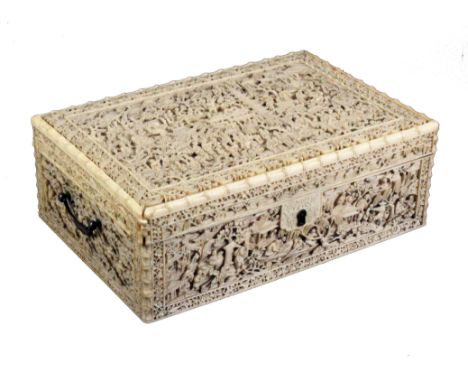 An exceptional Chinese export ivory sewing box, circa. 1820, of rectangular form each surface deeply carved with figures, pag