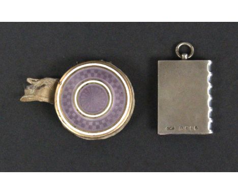 Two silver pin cushions, comprising a book form example, blue velvet infill, ring suspension, London, 1874 by Henry William D