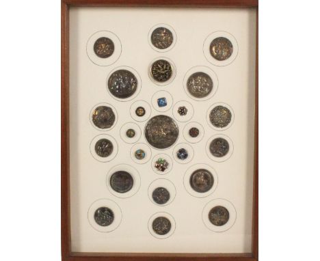 Buttons - a framed display of twenty five, comprising sixteen silver examples including six of riders and horses, two of hors
