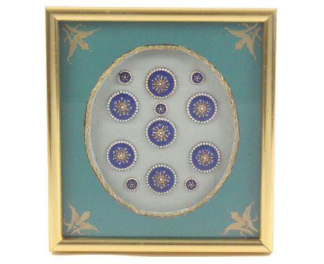 Buttons - a framed display of two sets of early 19th Century enamel buttons, probably French, comprising seven in blue enamel