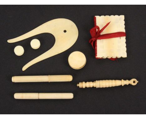 A mixed lot of 19th Century ivory sewing tools, comprising a lyre form lucet, 8.5cm, a reeded cylinder needle case, 7.2cm, an