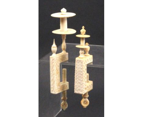 Two 19th Century ivory sewing clamps, comprising a rectangular frame example carved with flowers in the oriental style below 