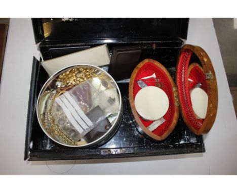 An inlaid Spanish trinket box; and a metal strong box with contents of various costume jewellery