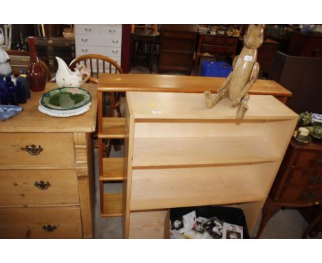 A pine book shelf and pine effect book shelf