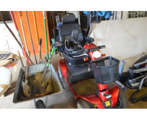 A Pride mobility scooter and accessories (believed to be in working order)