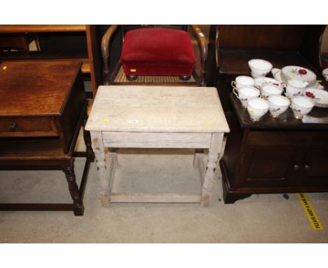A light oak joint stool style coffee table