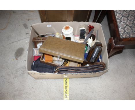 A box of miscellaneous items to include an oak barometer / thermometer; various china and glassware; metal ladle etc.