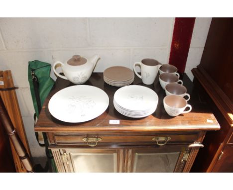 A Poole pottery twin tone teaset
