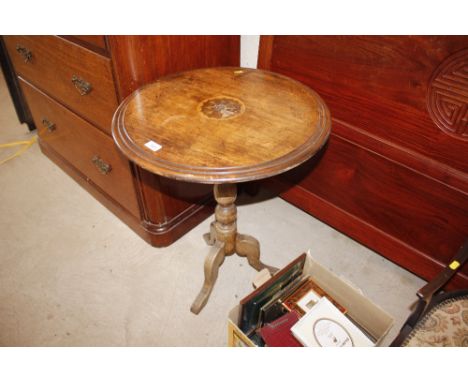 A Victorian inlaid tripod table 