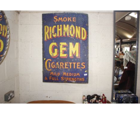 A vintage enamel advertising sign for "Richmond Gem" cigarettes