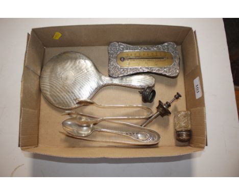 A silver backed hand mirror; a silver mounted easel barometer; various other silver and white metal items 