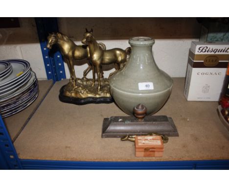 A brass horse group; a Celadon pottery lamp base; brass door stop etc.