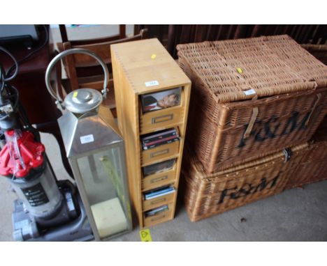 A light wood CD rack and contents of various CDs