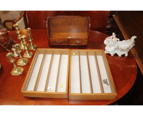 An oak Art Deco book shelf fitted with two drawers and two display cases