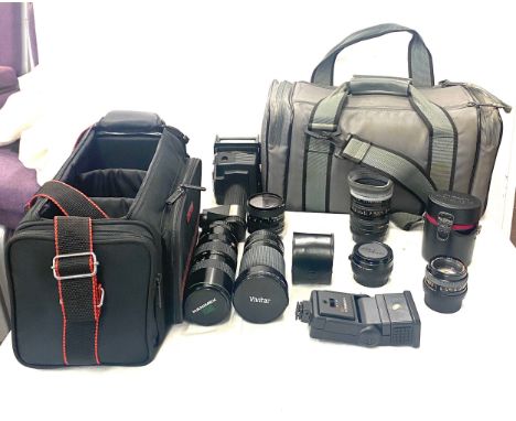 Selection of assorted lenses includes Hanimex auto zoom lense, tamroo skylight lense, auto chinon multi coated lense, sunpak 