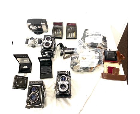 Large selection of assorted camera equipment includes Yashica 24 body parts, Paxetts 35mm camera etc 