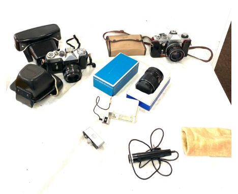 praktica camera and a Zenith ft camera with carl zeiss jena ddr, pentacon electric lense 