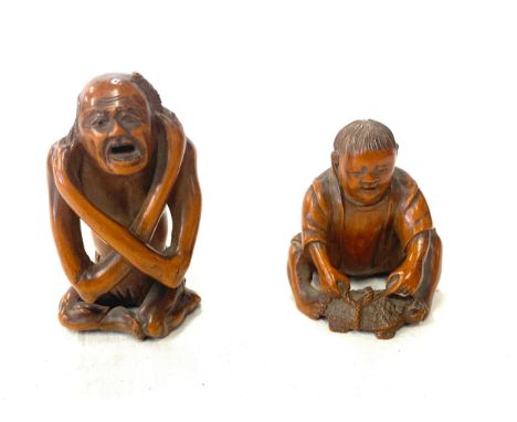 Two antique 19th century Japanese boxwood netsuke. Largest measuring 6.5cm 