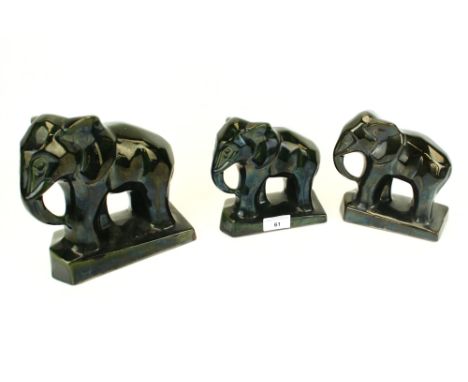 A set of three Art Deco glazed terracotta elephants. Graduated sizes max. H20cm